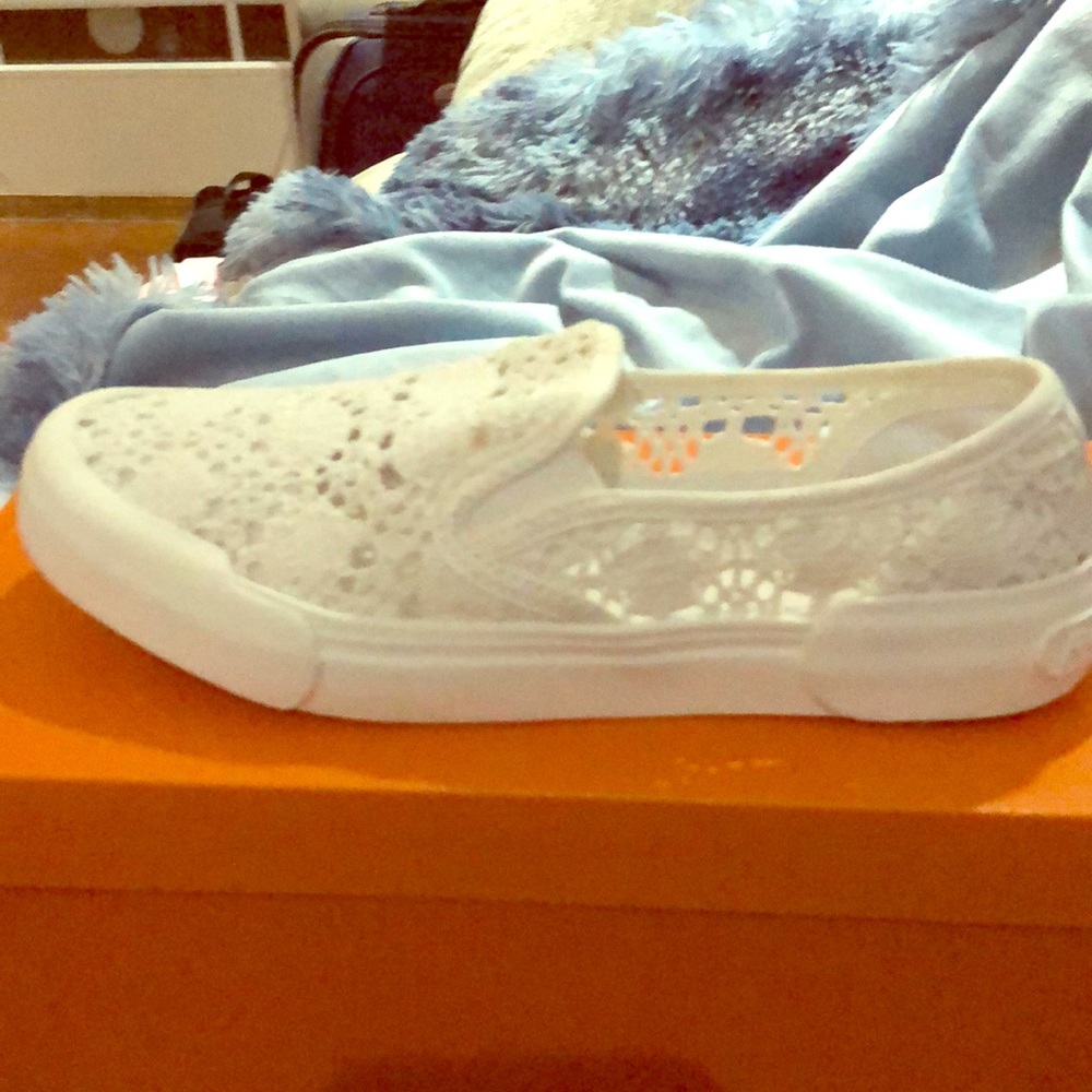 Beautiful lace slip on shoes.